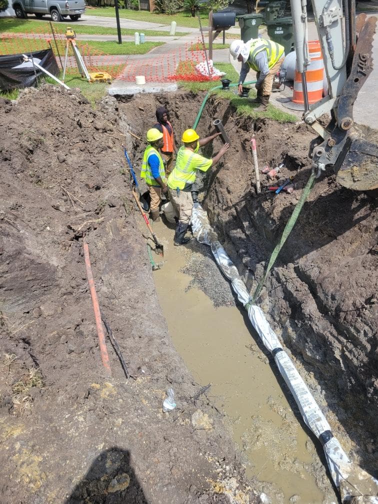 Water line crew working in open trench